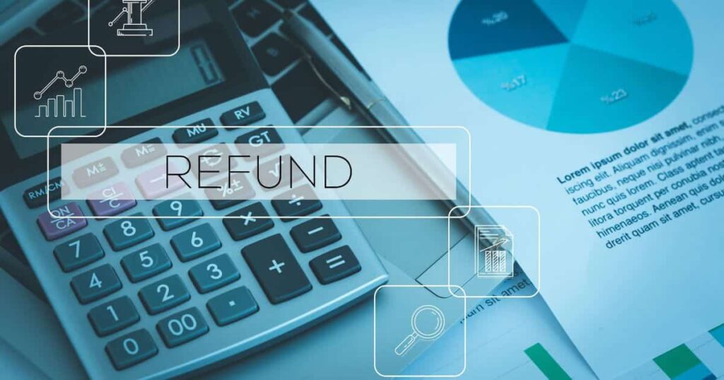 Calculatrice et documents avec diagramme à coté, écrit "refund" dessus